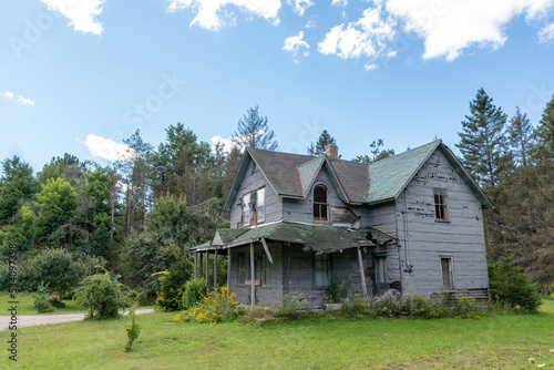 An old abandoned home sits crumbling and rotting away in a rural area on St. Joseph Island in Ontario.