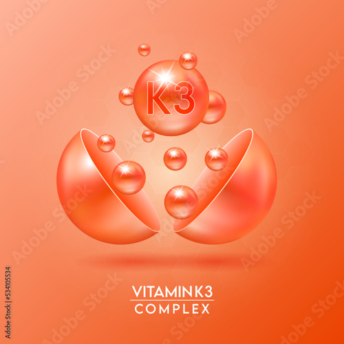 Vitamin K3 complex and Minerals float out of the capsule isolated on orange background. Dietary supplement for pharmacy advertisement, package design. Vector EPS10. photo