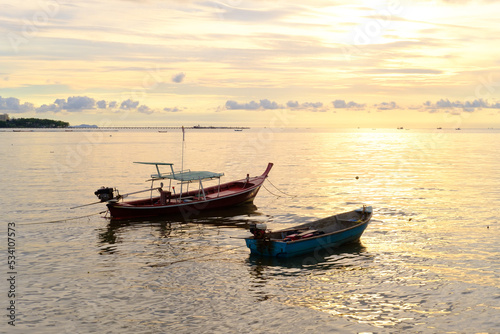 The fishing boat is in the Pattaya sea at sunset is beautifull © Phoomintr