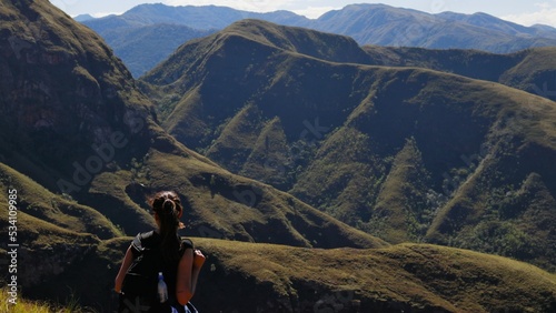 Young woman looking towards the mountains near Samaipata - Bolivia - CODO DE LOS ANDES - SANTA CRUZ BOLIVIA photo