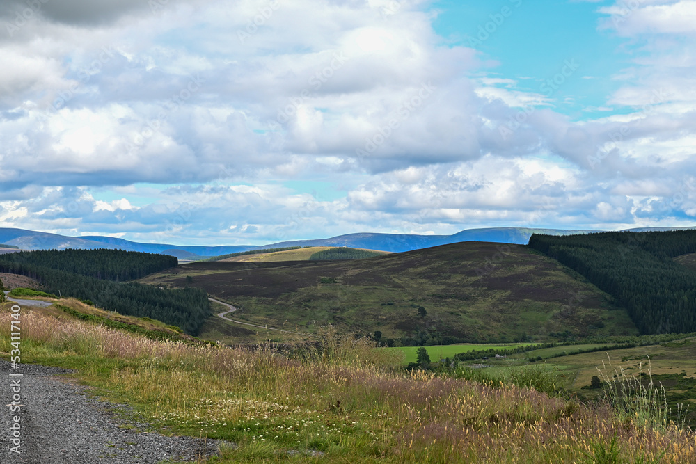 Fototapeta premium Panoramic view of mountains of the Cairngorms National Park at Grantown-on-Spey, Highland, Scotland
