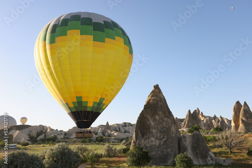 Colorful hot air balloon flying over Cappadocia Turkey