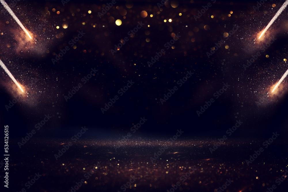 Fototapeta premium background of abstract black and gold glitter lights with fireworks. defocused