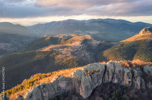 Aerial view of Rhodope Mountains with the rocks of Thracian sanctuary Belintash, Bulgaria photo