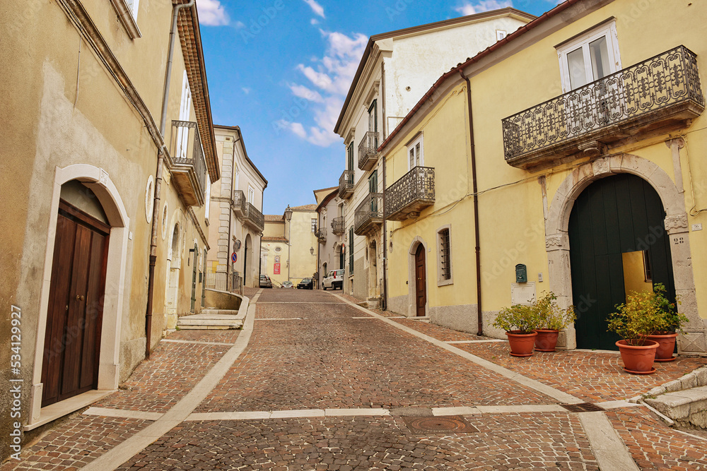 A small street between the houses of Frigento, a rural village in the province of Avellino in Italy.	