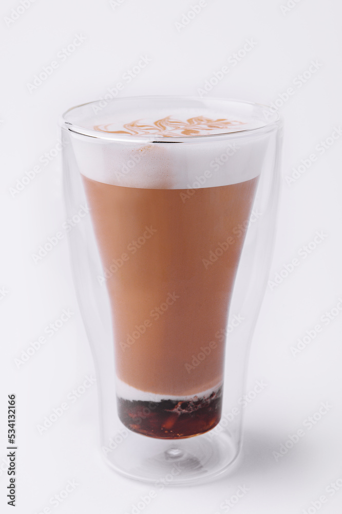 Glass of coffee macchiato with cream foam Glass of coffee macchiato with cream foam