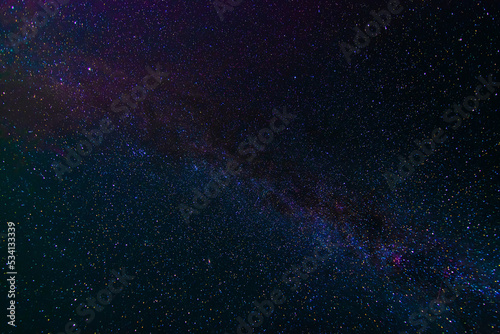 starry multicolored night sky with a bright milky way and galaxies. Astrophotography with many stars and constellations