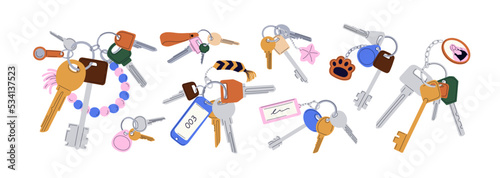 Door keys hanging on rings with keyfobs, keychains, tags, trinkets set. Different accessories, pendants, fobs on keyrings, holders. Flat graphic vector illustration isolated on white background