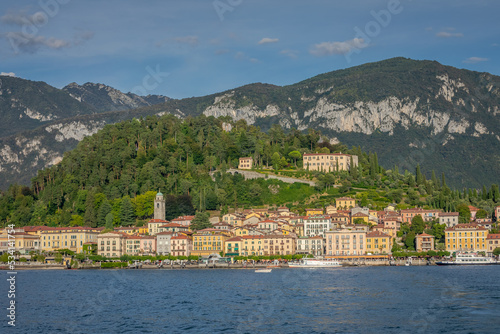 Mountains and Bellagio skyline, view from Lake Como at sunset, northern Italy © Aide