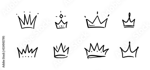 Doodle crown hand drawn set. Doodle princess crown, queen tiara. Line sketch royal element. Queen, king hand drawn simple design element. Isolated vector illustration.