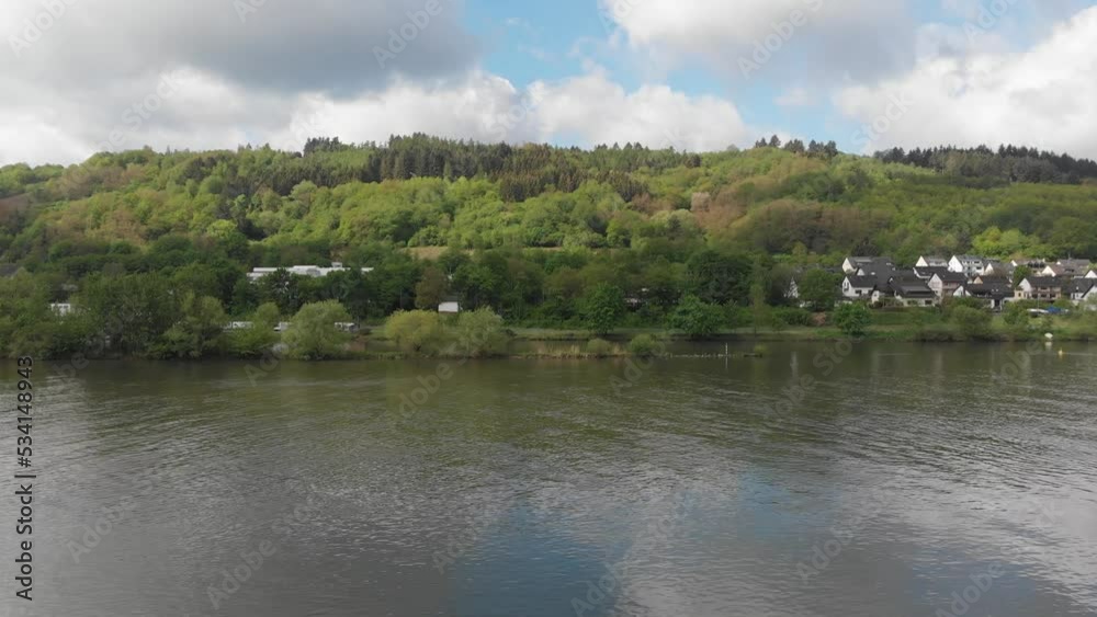 Aerial drone view over the river in the Mosel Valley, Germany. 4K videos. Aerial drone view over the river in the Mosel Valley, Germany. 4K videos.