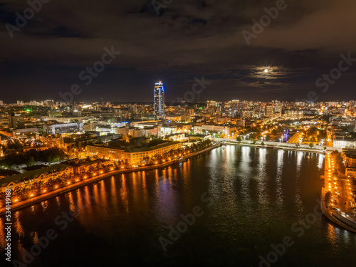 Embankment of the central pond and Plotinka in Yekaterinburg at summer or early autumn night. The historic center of the city of Yekaterinburg, Russia, Aerial View © Dmitrii Potashkin