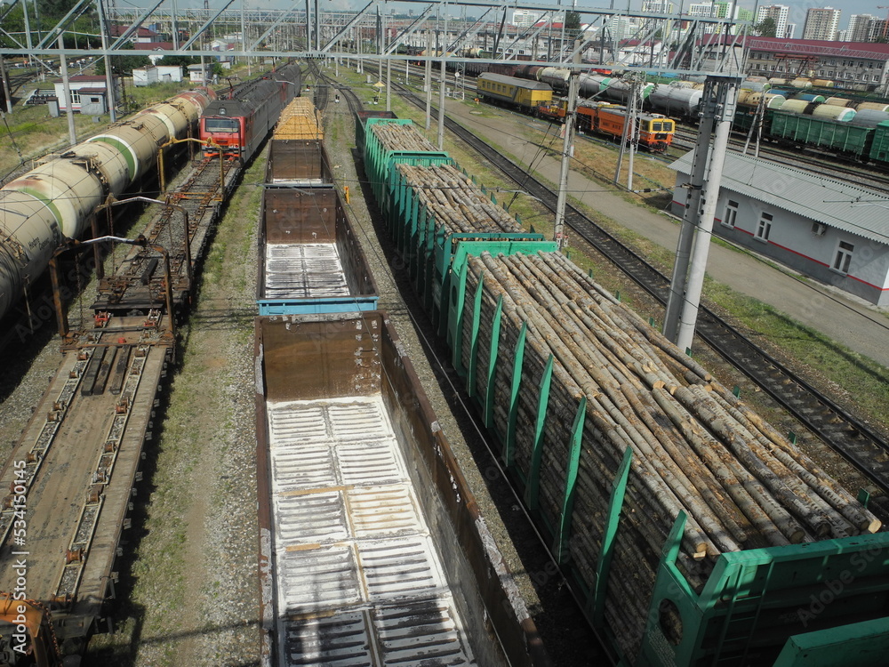 Freight wagons at the station, freight wagons on the railway tracks Freight wagons at the station, freight wagons on the railway tracks