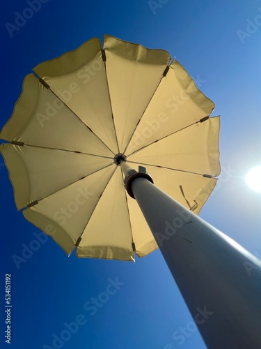 Parasol and blue sky