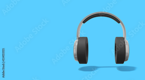 Realistic gray headphones on blue background with space for text. Front view. 3d rendering.