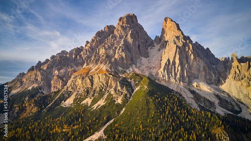 mountain and forest with sunset photo