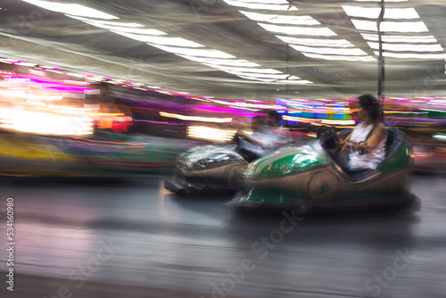 Abstract photo of bumper cars at amusement park of izmir fun fair. © ardasavasciogullari