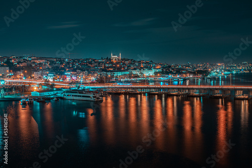 Cityscape view at night of Istanbul city and Bosphorus strait 