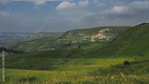 Panoramic views from Bolshoye Sedlo mountain to the Kislovodsk National Park and the city of Kislovodsk, North Caucasus, Russia. photo