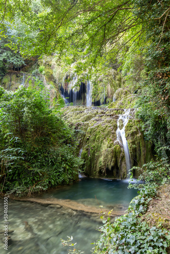 Krushunski waterfalls with turqoize waters and beautiful ecosystem