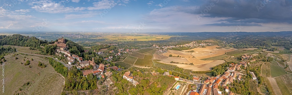 Drone view over the Po Valley from the mountains of Piedmont from the village of Camino during the day