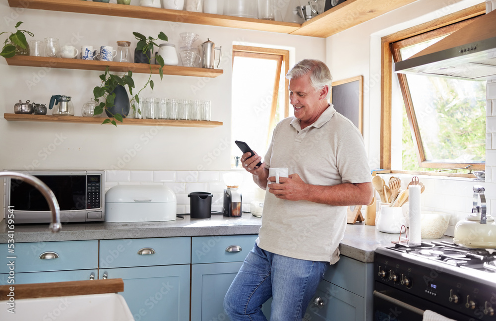 Coffee, phone and elderly man in kitchen texting and reading news or social media in his home. Happy, communication and 5g network with senior male enjoying fast internet and online app conversation Coffee, phone and elderly man in kitchen texting and reading news or social media in his home. Happy, communication and 5g network with senior male enjoying fast internet and online app conversation