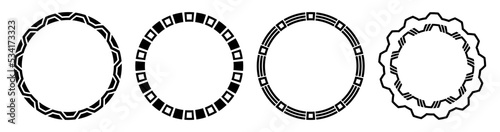 Set of four abstract round meanders, circular geometric ornaments, frames made of simple shapes. Geometric shapes, isolated on white background. Vector monochrome illustration.