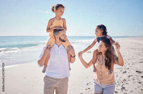 Black family, happy and beach summer vacation with quality time with children by the sea. Happiness of mother, man and kids with a smile walking together by the ocean water, waves and blue sky