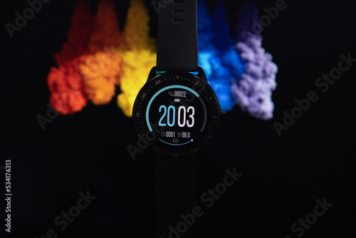 watch on black background smartwatch adverstisement apple samsung fitbit photo