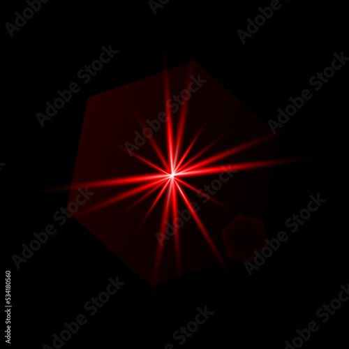 A red star. Light lines. Blurred lens lighting effect on a black background.