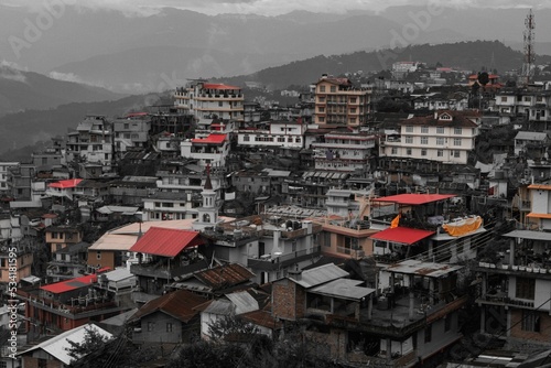 Drone shot of the beautiful cityscape of Kohima on a cloudy day in India photo