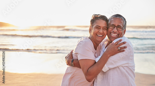 Senior couple  beach travel and hug by water of Dubai  happy on holiday for retirement and love by ocean. Portrait of elderly African man and woman hugging by sea during vacation with mockup space