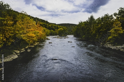 Valokuva View of Youghiogheny River with beautiful trees and clouds near Ohio Pyle State