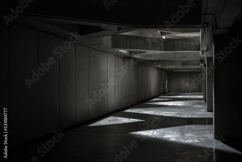 Empty underground concrete construction with light and shadow  Blank space background for any object