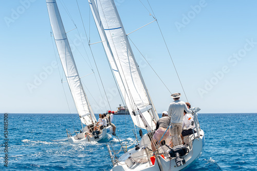 Sailing yachts regatta. Sailboats under sail in the race