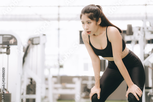 Asian female fitness athlete in gym © Kritdanai