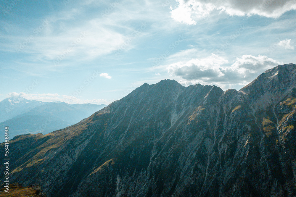 Fototapeta premium Swiss mountains forest in switserland sun sunset clouds hiking in a landscape