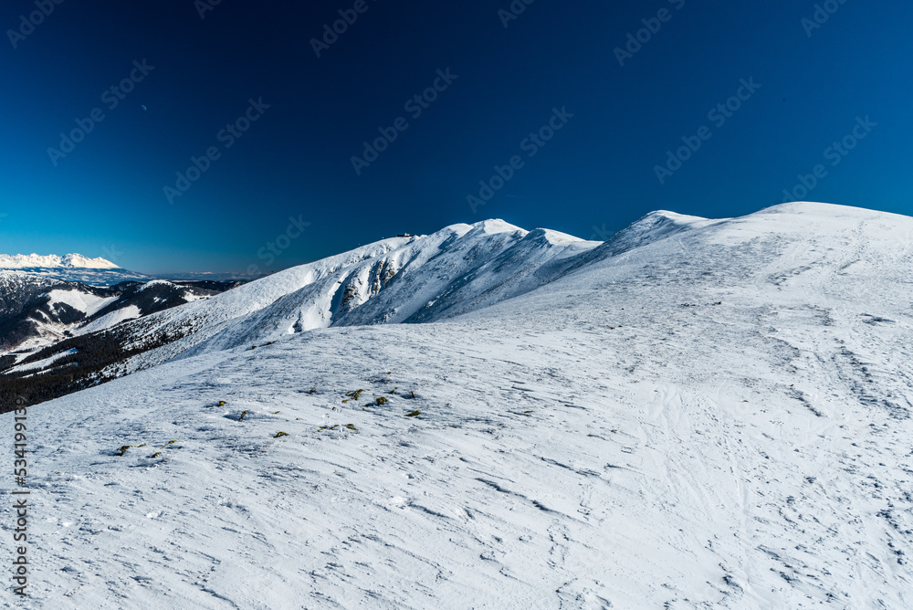 Winter Low Tatras and part of High Tatras from Sedlo Polany in Slovakia