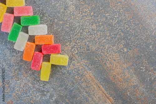  Square shape jelly candy flavor fruit on a dark background