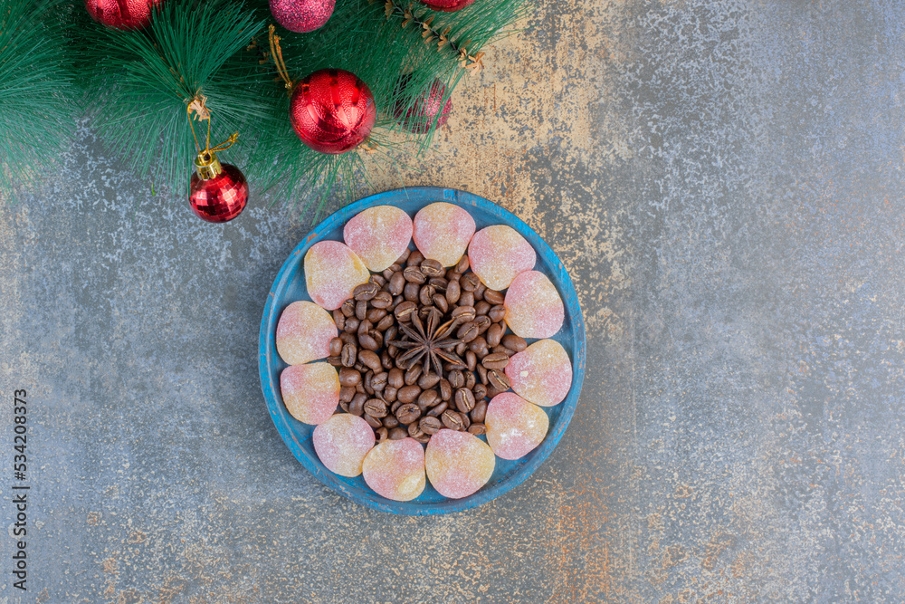 Heart shaped jelly sweets with coffee beans and star anise Heart shaped jelly sweets with coffee beans and star anise