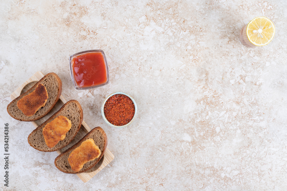 Fried chicken nuggets with sauces and spices Fried chicken nuggets with sauces and spices