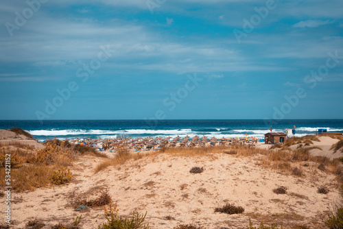 Beautiful sandy beach with turquoise water in Cala Mesquida  Mallorca  Spain. Selective focus.