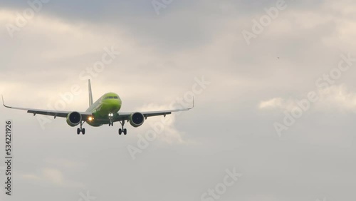 Paasenger jet airplane landing at Novosibirsk airport. Footage of a passenger plane arriving. Tourism and travel concept photo