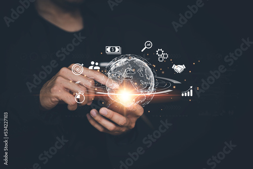 Businessman using smart phone . Global business internet connection application technology and digital marketing. Finance and Banking Digital Link Technology Big Data