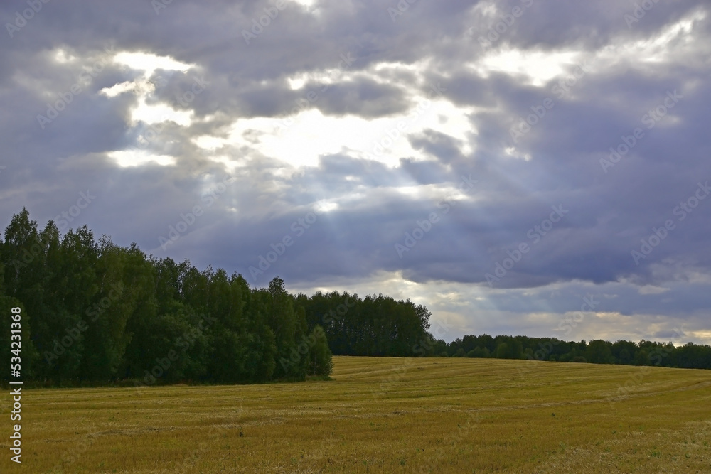 Autumn storm over empty rural fields