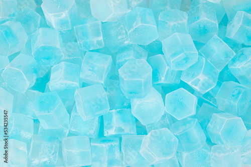 Blue ice cubes background texture. freshness. freezing. pieces of ice close up