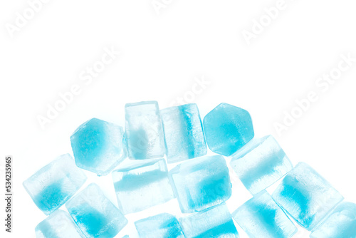 Blue ice cubes isolated white background. freshness. freezing. frozen pieces of ice close up