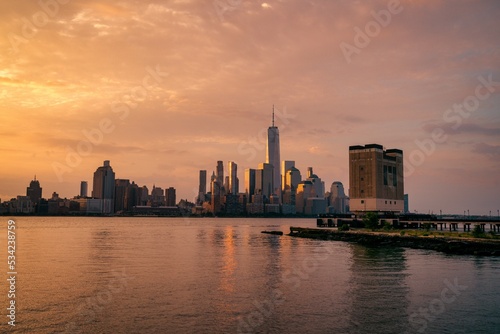 Panoramic New York City skyline at sunrise. Manhattan office buildings skyscrapers in the morning. Panoramic shot of New York City