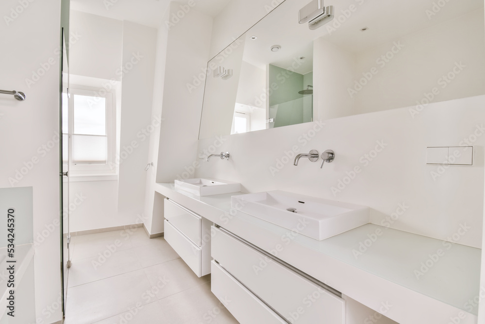 Minimalist white style bathroom with sinks Minimalist white style bathroom with sinks