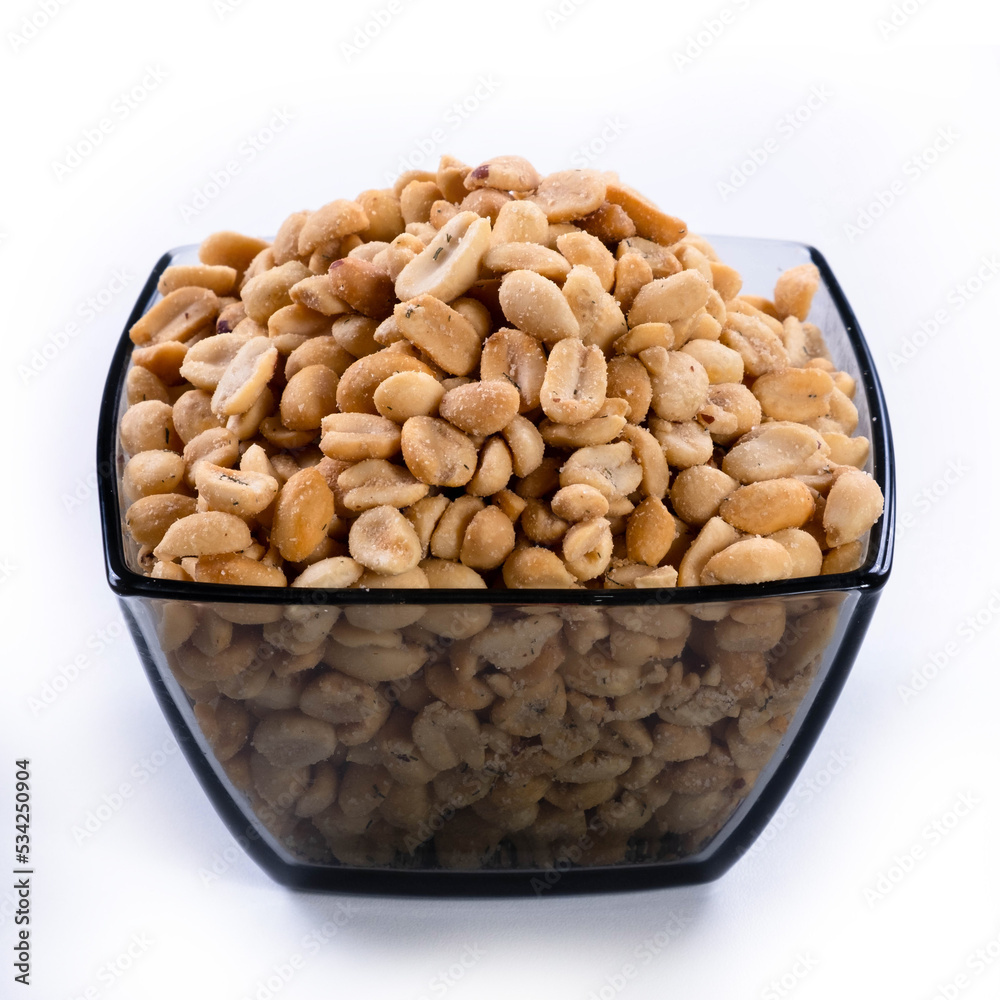 pile of spiced peanuts isolated close up on white background pile of spiced peanuts isolated close up on white background